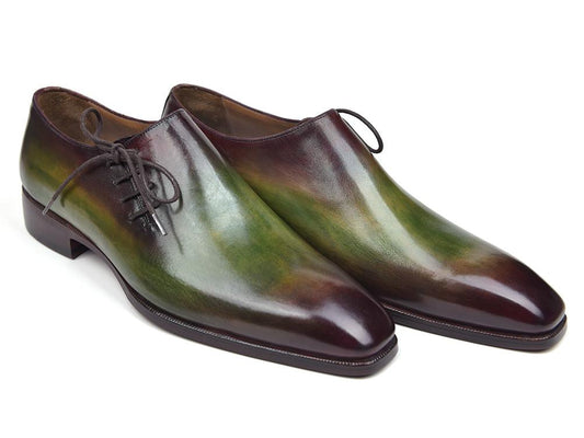 A pair of Paul Parkman Side Lace Oxfords Green & Bordeaux - 885F74, crafted with polished green and burgundy hand-painted leather, are displayed side by side on a white background. These made-to-order shoes boast a unique hue that captivates the eye.