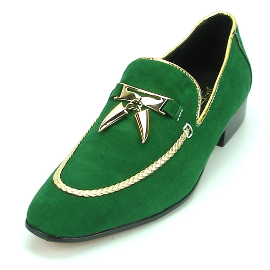 The FI-7157 Green Suede Fiesso by Aurelio Garcia, from the Fiesso brand, is a slip-on fashion shoe characterized by its green suede material and gold trim. It features a decorative metal embellishment on the front and includes a cushioned insole for enhanced comfort.