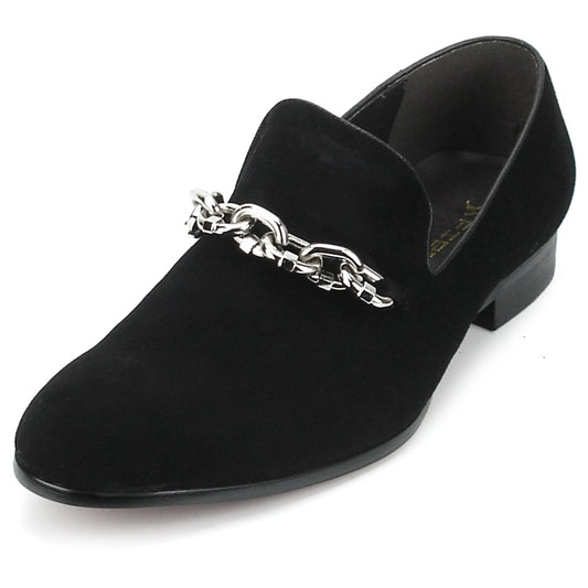 The FI-7191 Black Fiesso by Aurelio Garcia slip-on shoe showcases a sophisticated black suede upper, beautifully accented with a silver chain detail, making it an ideal fashion choice for any stylish ensemble.