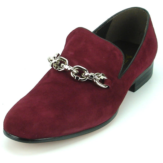 The FI-7191 Burgundy Fiesso by Aurelio Garcia is a fashion shoe from the Fiesso brand, featuring silver chain detailing on top and a sleek black heel, offering a stylish slip-on design.