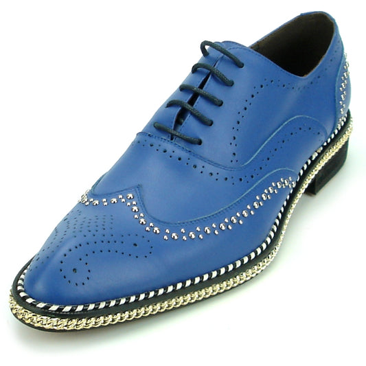 The FI-7201 Blue Fiesso by Aurelio Garcia shoe from the brand Fiesso features a leather upper adorned with decorative perforations and silver studs. This stylish fashion shoe is finished with black laces and a braided trim along the sole.