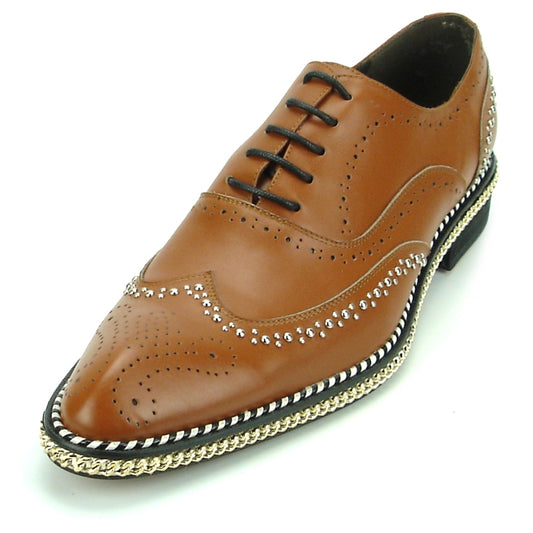 The FI-7201 Tan Fiesso by Aurelio Garcia Shoes feature a brown leather upper, black laces, decorative perforations, and a thick silver chain trim embellishing the sole.
