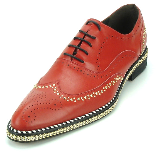The FI-7201 Red Fiesso by Aurelio Garcia Shoes from the brand Fiesso are red leather dress shoes adorned with decorative perforations, gold studs, and black laces. They feature a black sole accented with a gold and white braided trim and a cushioned insole for added comfort.