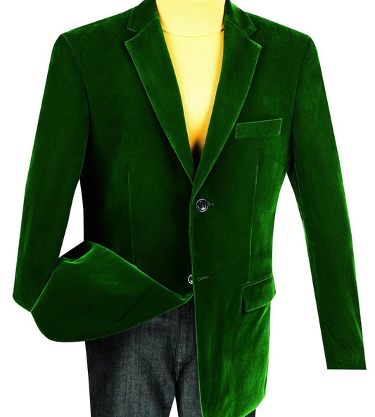 The Velvet Regular Fit Fashion Jacket in Emerald by Vinci Suits is styled with a yellow turtleneck and dark pants.