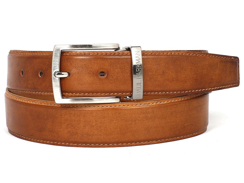 The Paul Parkman Men's Handmade Leather Belt, hand-painted in tobacco brown with a silver buckle, elegantly displays the Paul Parkman brand name engraved on the metal loop and rests coiled on a white background.