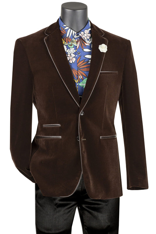 A mannequin showcases the Vinci Suits Slim Fit Velvet Sport Coat (Brown) BS-02, paired with a floral shirt, black pants, and adorned with a white boutonnière on the lapel.