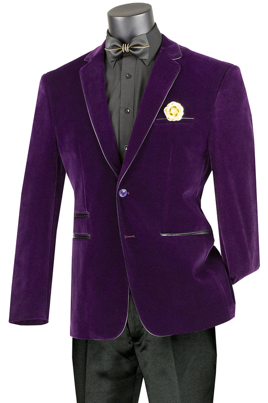 The Vinci Suits Slim Fit Velvet Sport Coat (Purple) BS-02, styled in chic slim fit, pairs black lapels with a matching shirt and features a bow tie, faux leather trim, and a striking yellow flower in the pocket.