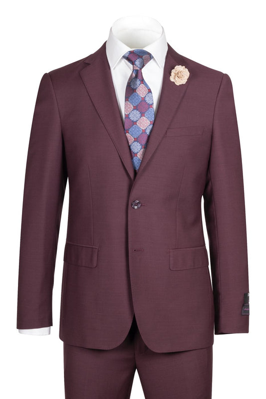The Porto Burgundy Slim Fit Pure Wool Suit by Tiglio Luxe, teamed with a white dress shirt, patterned tie, and rose lapel pin, epitomizes European styling in men's fashion.