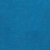 Inserch's cotton blend turtleneck sweaters, part of the 4708 collection featuring ten color options, are elegantly displayed. The vibrant orange, white, and green variations rest on a wooden chair with a patterned cushion, while other regular fit options in red, blue, and black are arranged gracefully on the ground below.