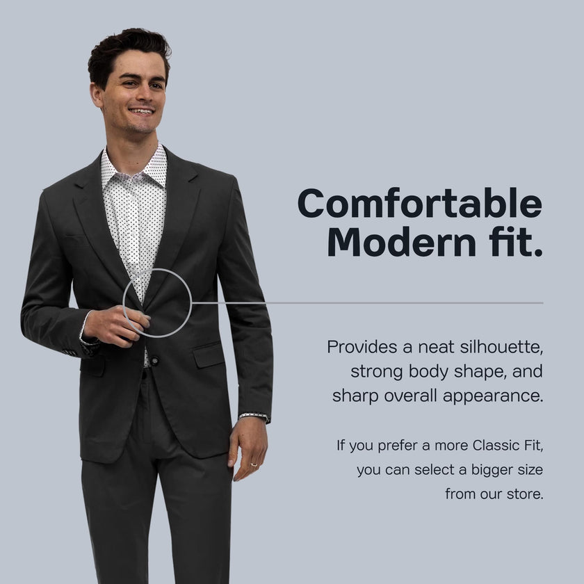 A man sporting an EJ Samuel Black Solid Chino Blazer CHJ01 over a floral shirt stands confidently, adjusting his sunglasses with one hand.