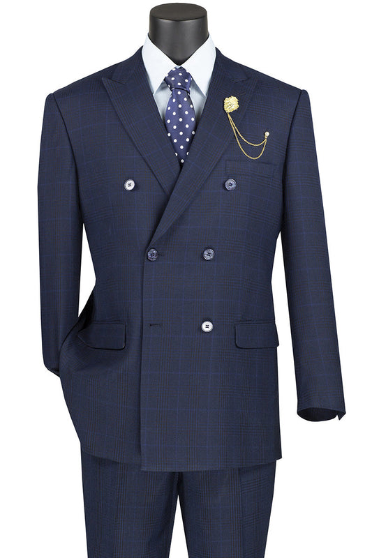 Pair the 2 Piece Double Breasted Windowpane Suit in navy from Vinci Suits with a white shirt, polka dot tie, and accessorize with a gold lapel chain pin.