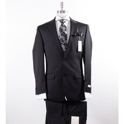 Displayed on the mannequin is a Michael Kors Modern Fit Solid Black KEVI2K2Z1151 suit, featuring a sleek 2-button jacket. It's styled with a floral tie, pocket square, and white shirt, complete with visible price tags.