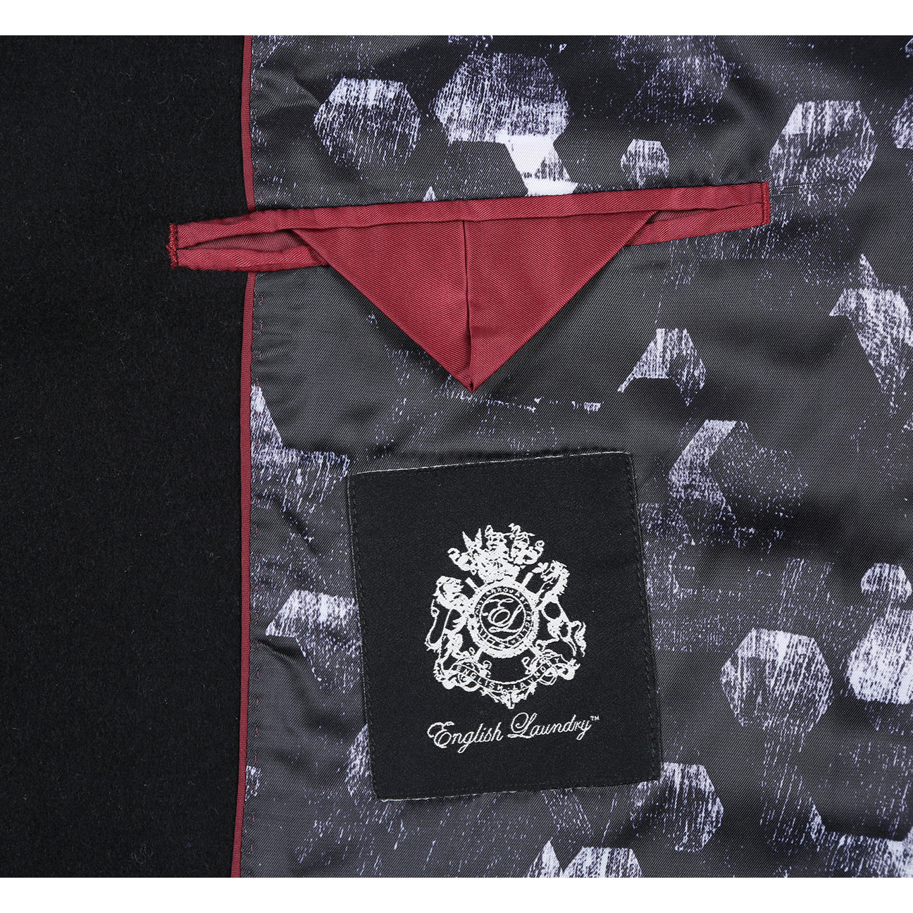 ENGLISH LAUNDRY Wool Blend Breasted Black Top Coat (EL53-01-001) by English Laundry is an ideal men's overcoat for formal occasions, featuring three buttons and perfect for pairing with a white shirt and a navy blue tie with white polka dots.