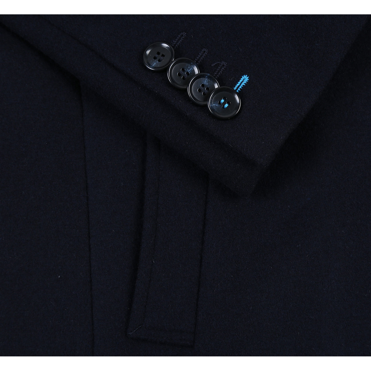 The ENGLISH LAUNDRY Wool Blend Breasted Navy Top Coat EL53-01-410 by English Laundry is a versatile choice that can perfectly complement a black suit jacket, a white shirt, and a black tie with small white dots, creating an elegant layered look suitable for any occasion.