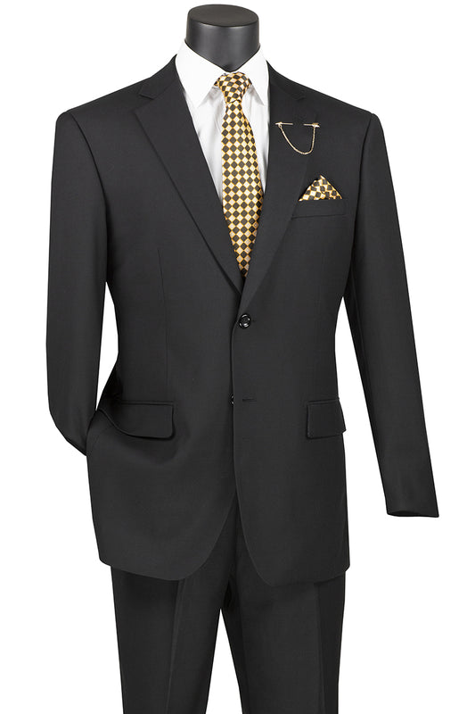 The mannequin displays a Vinci Suits 2 Piece Suit with 2" Adjustable Waist Band in black, featuring a white shirt, gold checkered tie, and matching pocket square. The chain accessory complements the wool feel of the fabric, while the notch lapel completes the sophisticated look.