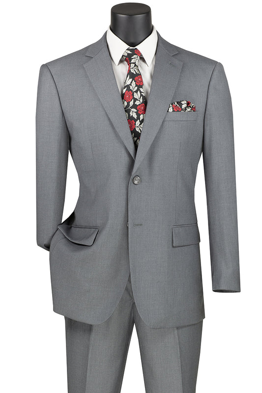 Displayed on a mannequin, the Vinci Suits 2 Piece Suit F-2C900 in medium gray features a floral tie and matching pocket square. Designed for comfort with a 2″ adjustable waistband, it offers a luxurious wool feel, perfect for elevating any occasion.