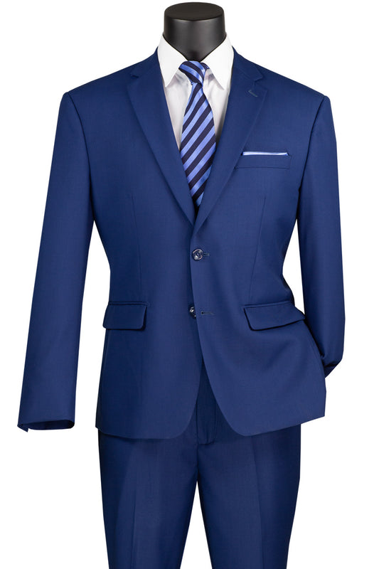 A mannequin wears a Vinci Suits 2-piece suit (F-2C900) in twilight blue, with a single-breasted jacket featuring a notch lapel. A white shirt and matching striped tie complete the ensemble, emphasizing the luxurious wool feel.