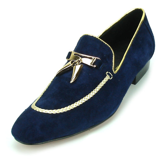 Introducing the Fiesso FI-7157 Navy Suede Loafers by Aurelio Garcia, a fashion-forward design that features a luxurious leather upper adorned with a sophisticated gold metal ornament and elegant braided trim. These loafers offer enhanced comfort with their cushioned insole and are finished off with a stylish low black heel.