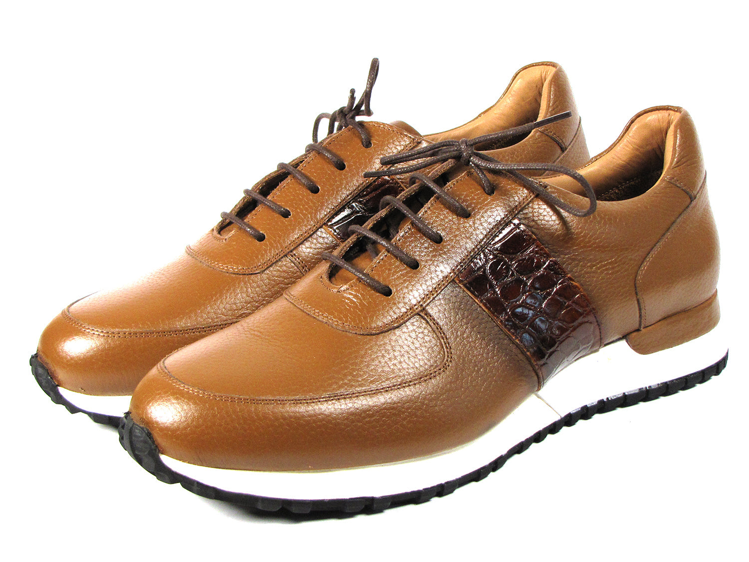 These Paul Parkman Men's Cognac Floater Leather Sneakers - LP206CGN feature a sleek brown leather design with cognac floater leather accents, complemented by white soles and dark brown laces, all beautifully showcased on a white background. Celebrate individuality with this made-to-order item from the Paul Parkman brand, perfect for those who value exceptional craftsmanship.