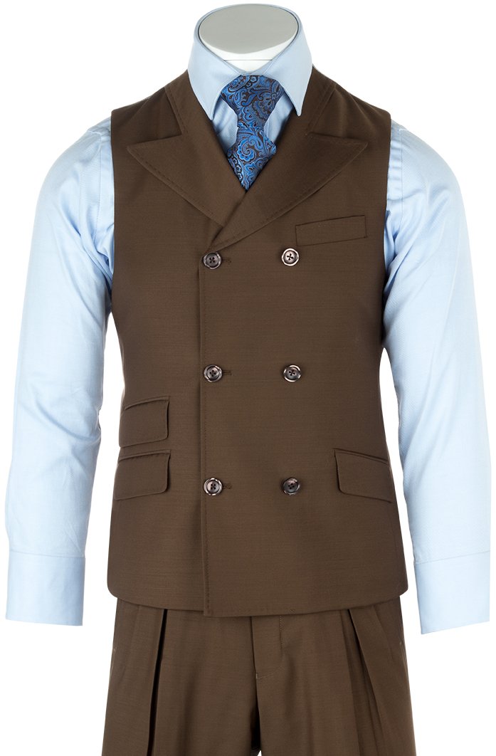 A sophisticated three-piece ensemble is elegantly displayed on a mannequin, featuring the Tiglio Rosso San Giovesse Tobacco suit paired with a blue patterned tie, matching pocket square, and a light blue shirt, all exemplifying the elegance of 100% wool.