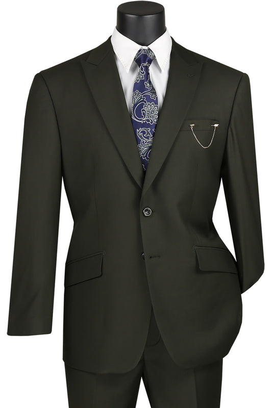A Vinci Suits Modern Fit Suit with Peak Lapel in olive, displayed on a mannequin, includes a white dress shirt and blue patterned tie. This single-breasted ensemble features peak lapels, highlighted by a silver chain accessory on the breast pocket.
