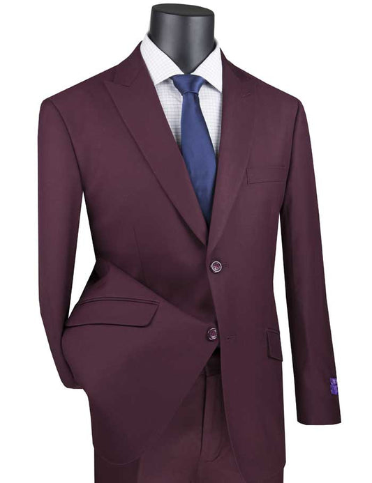The Modern Fit Suit with Peak Lapel by Vinci Suits in maroon, paired with a white checkered dress shirt and navy blue tie, showcases timeless elegance on a mannequin.