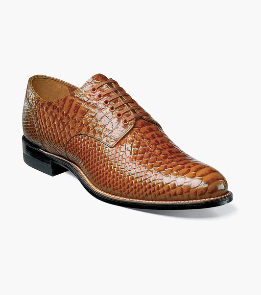 The STACY ADAMS Madison Anaconda Plain Toe Oxford (Tan, 00055-240) is a men's dress shoe in shiny, textured anaconda-print leather with laces and a black sole, shown on a white background.
