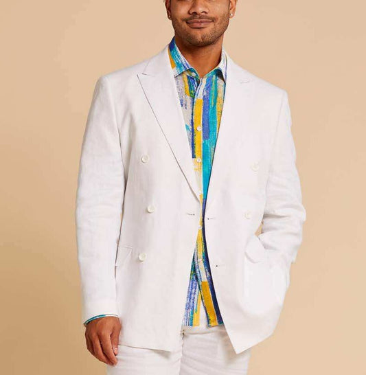 Wearing the Inserch Premium Linen Double Breasted Blazer BL660-02 in white from Inserch, paired with a vibrant striped shirt underneath, a person stands confidently against a beige background.