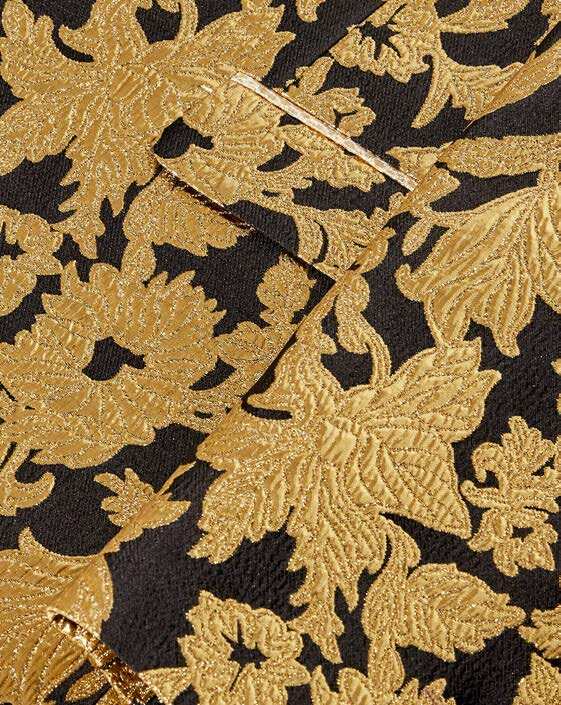 The Inserch Floral Jacquard Double Breasted Blazer BL204-165 Black/Gold features a slim-fit design with an intricate gold floral pattern and sleek black satin lapels, showcased on a plain background.