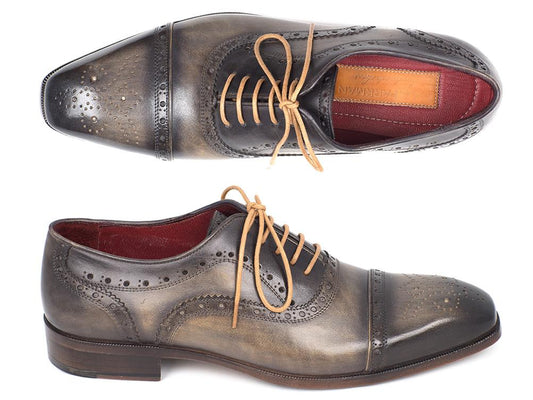 A top and side view of the Paul Parkman Captoe Oxfords Gray - 024-GRAY, showcasing decorative perforations and light brown laces, crafted with hand-painted leather.