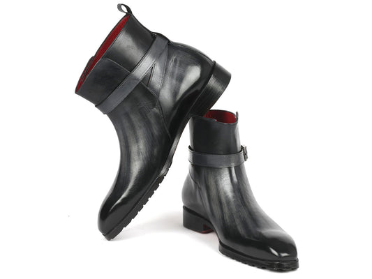 Two gray patina Jodhpur boots from Paul Parkman with a sleek, made-to-order design and a strap detail around the ankle.