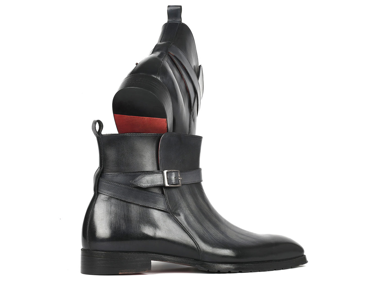 A pair of expertly made-to-order Paul Parkman Men's Gray Patina Jodhpur Boots, featuring a glossy finish, small heel, and side buckle for a perfect fit.