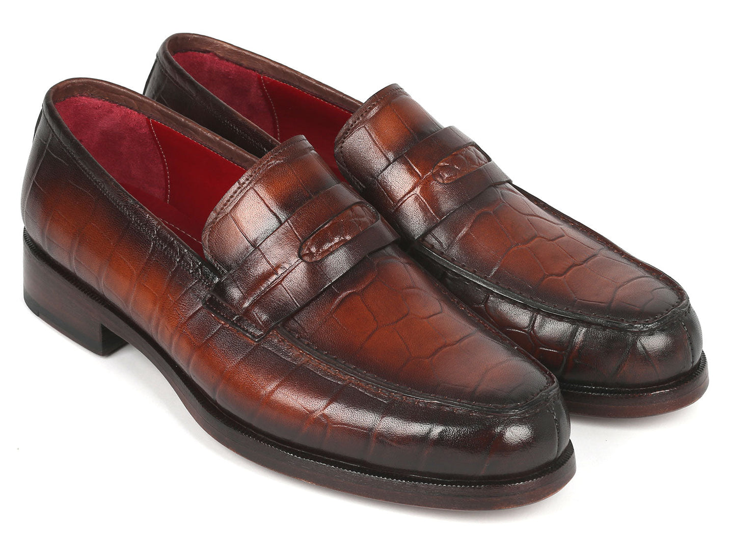Paul Parkman Brown Crocodile Embossed Calfskin Penny Loafers - 3857-BRW, featuring a striking red interior lining, are showcased on a white background.