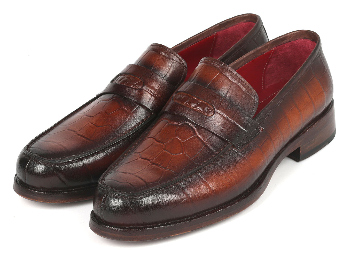 Paul Parkman Brown Crocodile Embossed Calfskin Penny Loafers - 3857-BRW, featuring a striking red interior lining, are showcased on a white background.
