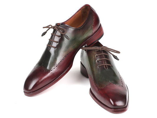 A pair of Paul Parkman Bordeaux & Green Wingtip Oxfords - 097YL63, featuring a handmade design with a polished burgundy and green finish, exquisite wingtip oxford detailing, and brown laces.