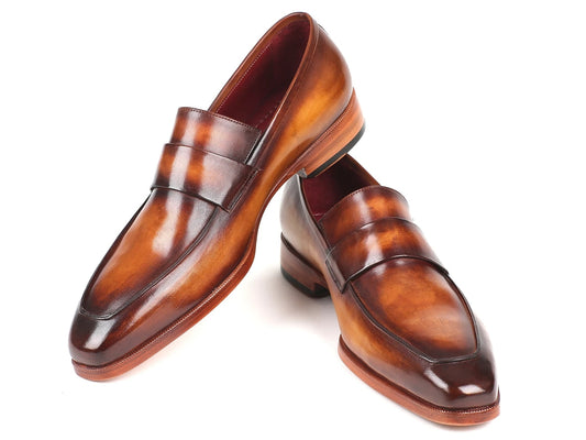 A pair of Paul Parkman Loafers Brown - 093-BRW, crafted from polished calfskin leather with penny straps, set on a white background.