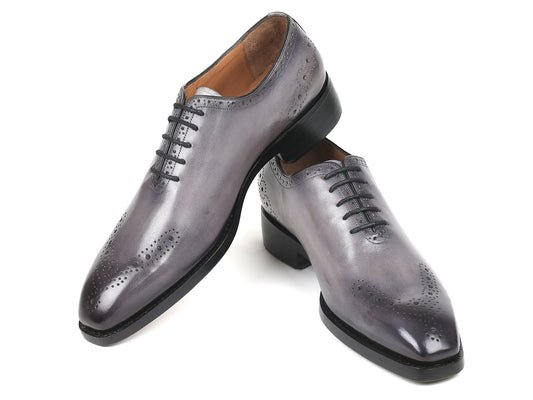 Paul Parkman Goodyear Welted Punched Oxfords Gray - 7614-GRY are elegant gray leather dress shoes crafted from hand-painted calfskin, featuring perforated detailing and black laces. They include a Goodyear welted sole, ensuring long-lasting style and quality from the renowned brand Paul Parkman.
