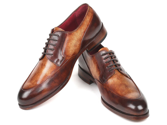 The Paul Parkman Dual Tone Brown Derby Shoes - 995-BRW are showcased, with one pair resting against the other. Crafted by Paul Parkman, these bespoke shoes boast a polished calfskin upper and lace-up design, embodying classic elegance and meticulous craftsmanship.