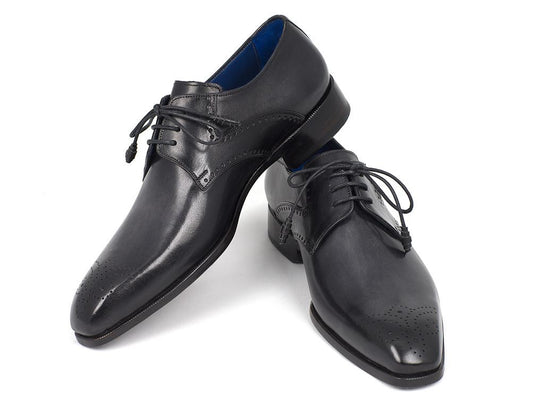 The Paul Parkman Black Medallion Toe Derby Shoes (model 6584-BLK) for men feature black leather with laces and subtle decorative perforations on the medallion toe caps, set against a plain white background.