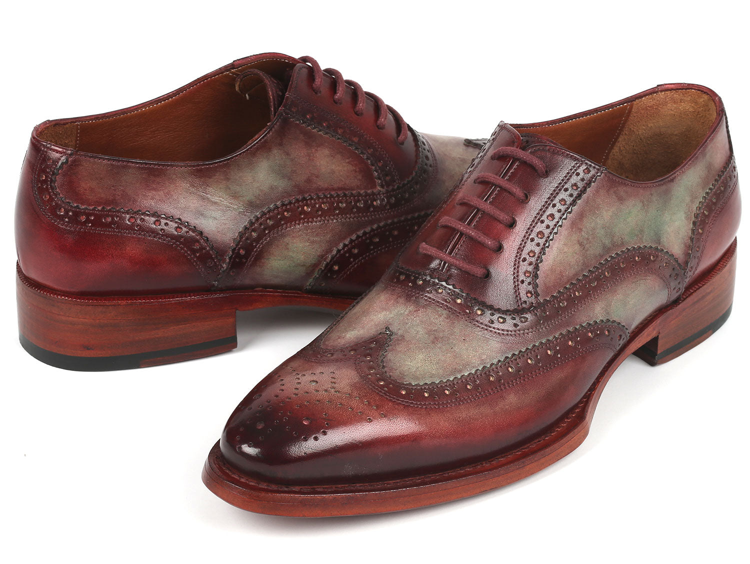 The Paul Parkman Goodyear Welted Men's Two Tone Wingtip Oxfords - PP22GB62, in a polished brown and green, features intricate perforations crafted from hand-painted leather, set against a plain white background.