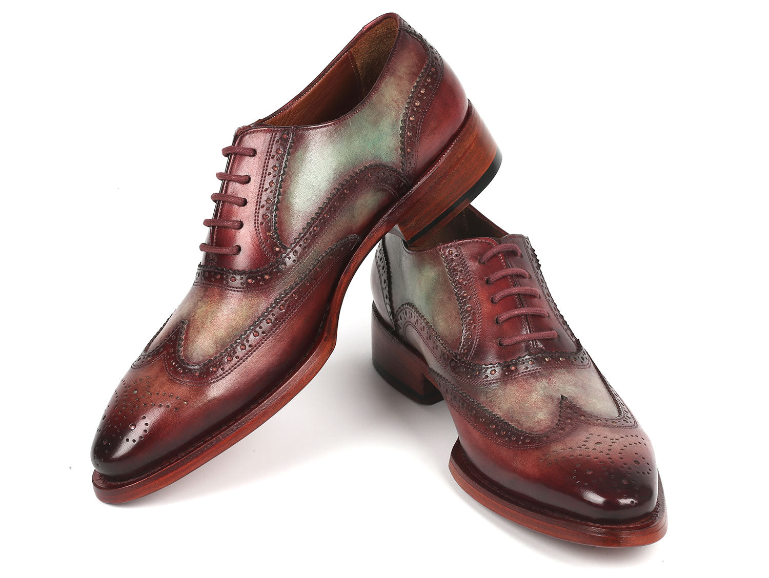 The Paul Parkman Goodyear Welted Men's Two Tone Wingtip Oxfords - PP22GB62, in a polished brown and green, features intricate perforations crafted from hand-painted leather, set against a plain white background.