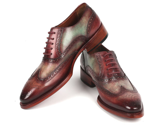 The Paul Parkman Goodyear Welted Men's Two Tone Wingtip Oxfords - PP22GB62, in a polished brown and green, features intricate perforations crafted from hand-painted leather, set against a plain white background.