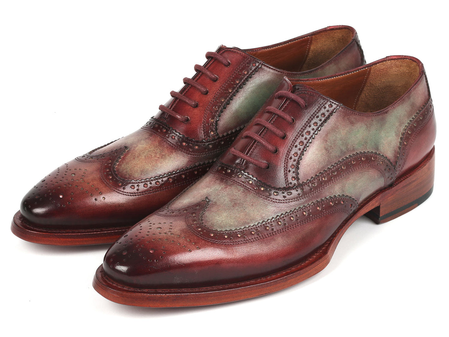 The Paul Parkman Goodyear Welted Men's Two Tone Wingtip Oxfords - PP22GB62, in a polished brown and green, features intricate perforations crafted from hand-painted leather, set against a plain white background.