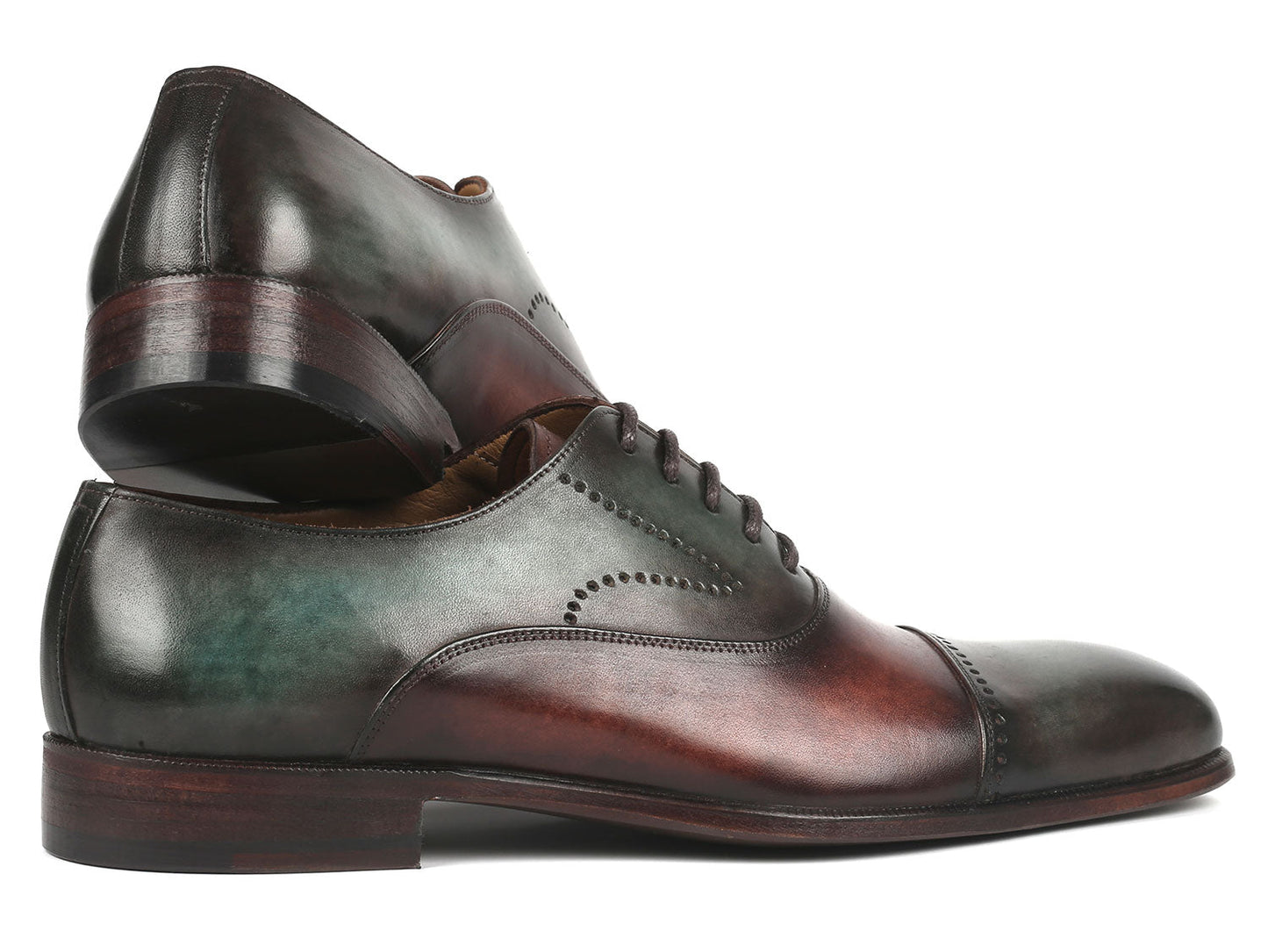The Paul Parkman Men's Cap Toe Oxfords in Green & Brown 314-GRNBRW are handcrafted shoes featuring perforated details and lace-up closures, displayed overlapped.