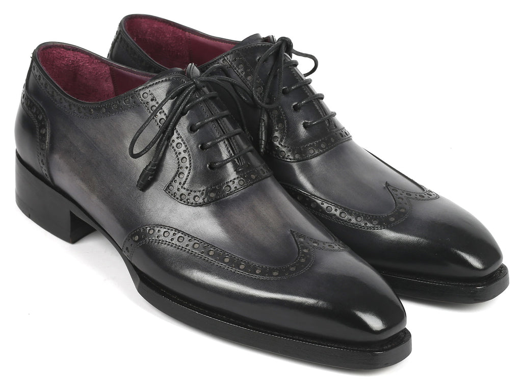 A pair of Paul Parkman Goodyear Welted Men's Wingtip Oxfords in black and gray, style number 6819-GRY, featuring polished leather with exquisite decorative broguing and laces.