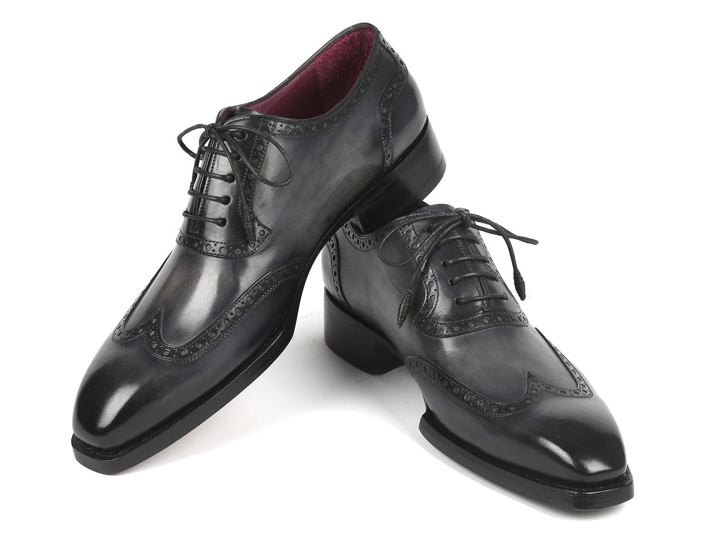 A pair of Paul Parkman Goodyear Welted Men's Wingtip Oxfords in black and gray, style number 6819-GRY, featuring polished leather with exquisite decorative broguing and laces.