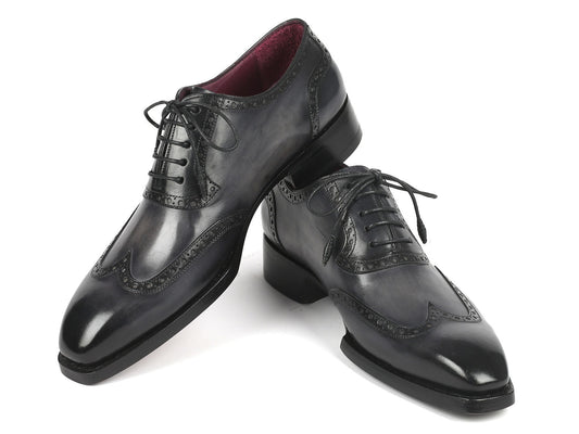 A pair of Paul Parkman Goodyear Welted Men's Wingtip Oxfords in black and gray, style number 6819-GRY, featuring polished leather with exquisite decorative broguing and laces.