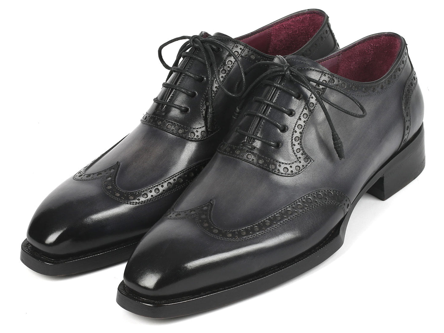 A pair of Paul Parkman Goodyear Welted Men's Wingtip Oxfords in black and gray, style number 6819-GRY, featuring polished leather with exquisite decorative broguing and laces.