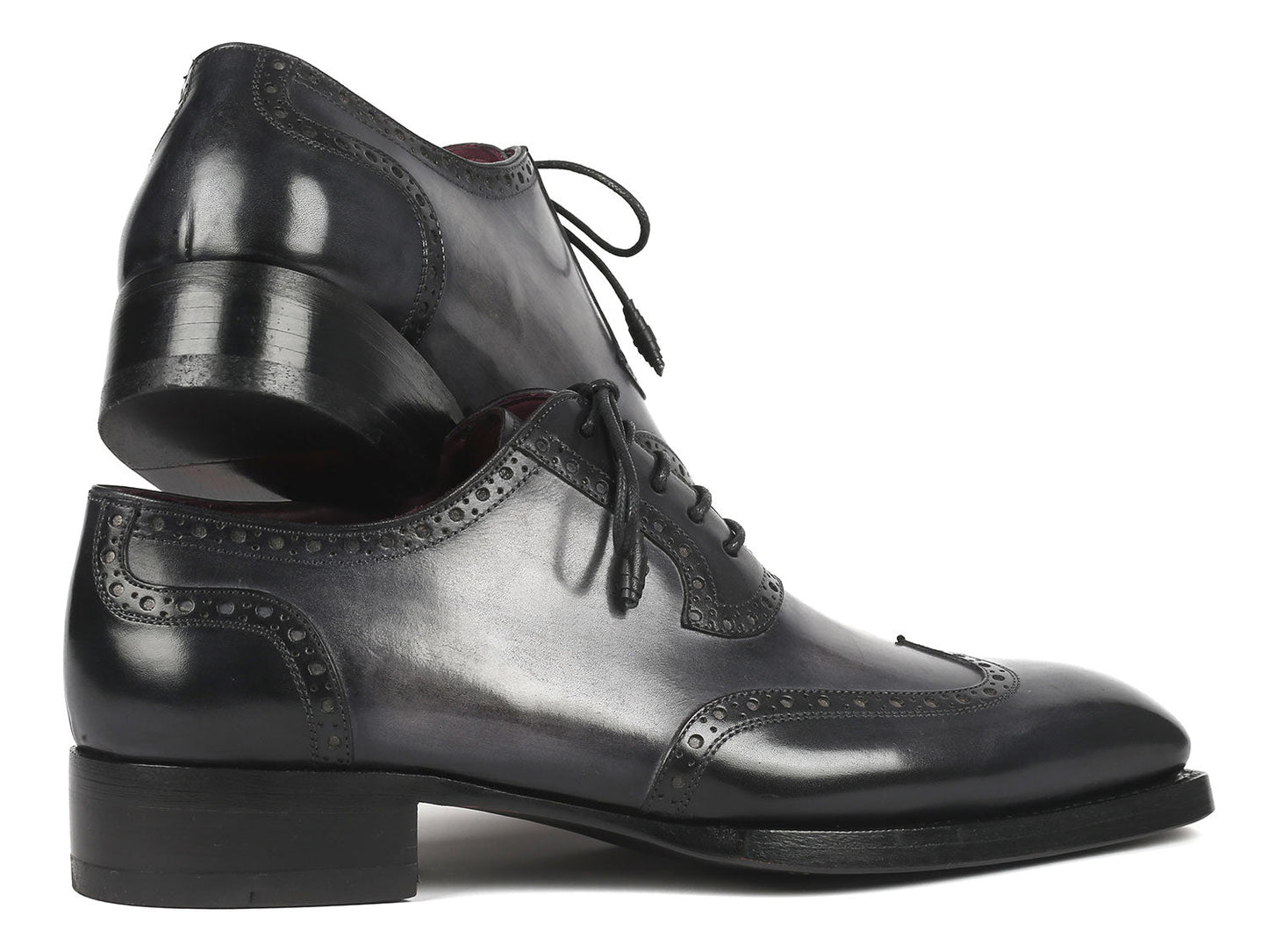 A pair of Paul Parkman Goodyear Welted Men's Wingtip Oxfords in black and gray, style number 6819-GRY, featuring polished leather with exquisite decorative broguing and laces.