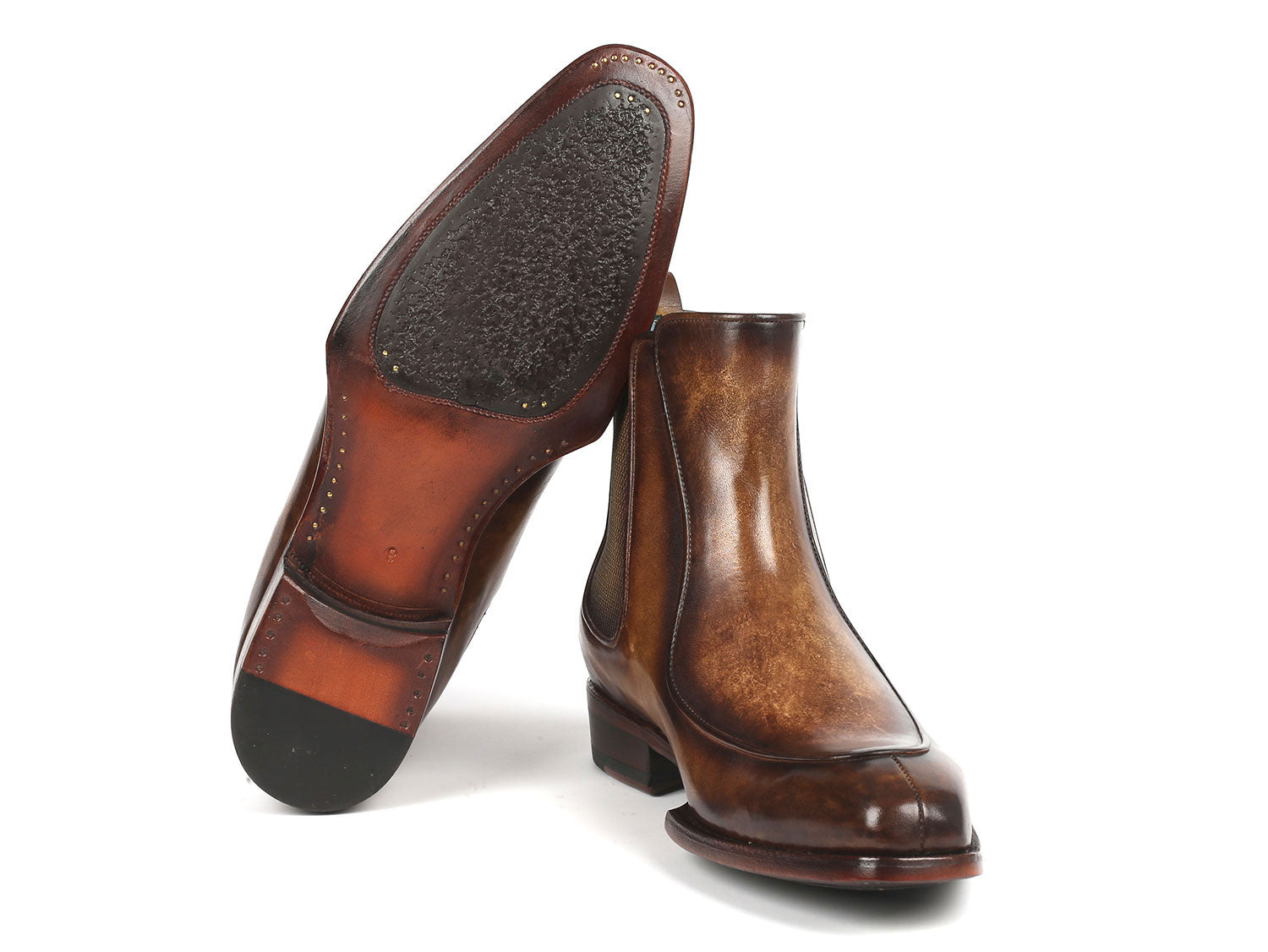 The Paul Parkman Men's Brown Handpainted Chelsea Boots Goodyear Welted - BT822BRW are meticulously crafted from hand-painted leather with a polished finish, featuring elastic side panels and a low heel.